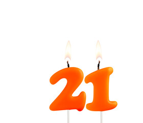 Orange birthday candle on white background - Number 21