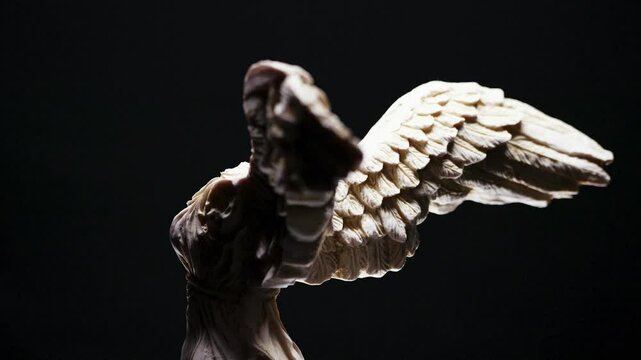Ancient Greek Nike Statue Samothrace Island Wings and Body Details Close-up with Black Background