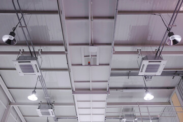 Studio ceiling with spotlight and air conditioner