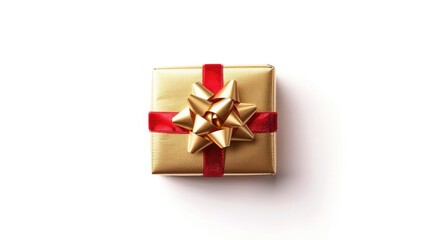 Obraz premium A luxurious Christmas gift box wrapped in metallic gold paper with a red velvet ribbon bow