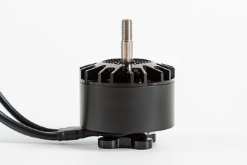 Motor for the FPV drone on a white background. It is suitable for many types of quadcopters. Close-up.