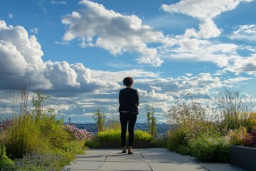 Obraz premium Woman enjoying rooftop view of clouds and nature