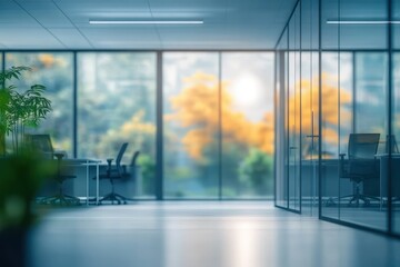 Fototapeta premium Modern Office Interior with Blurred Glass Partition and Natural Lighting