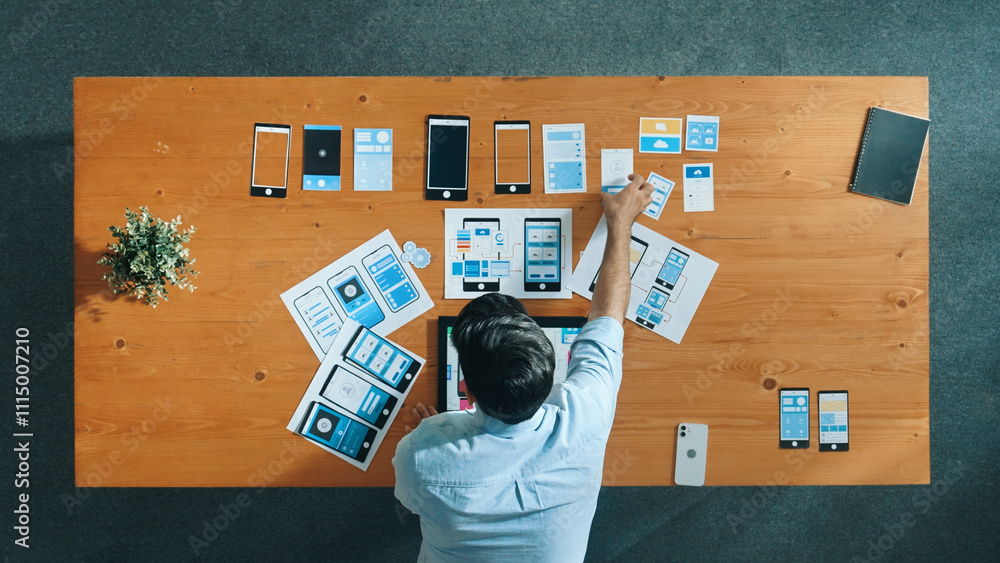 Poster top view of skilled developer walking and placing ux ui software. smart business man put tablet on m