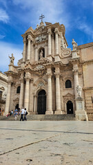 Obraz premium The Metropolitan Cathedral of the Nativity of the Virgin Mary in Syracuse is a Roman Catholic church in Syracuse, Sicily, located in the historic center of the city on the island of Ortygia