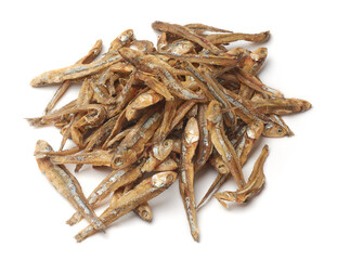 Obraz premium pile of dried sprats or anchovies isolated white background, preserved small oily fish with strong salty flavor 