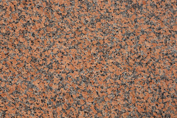 Fototapeta premium A stone-patterned wall.