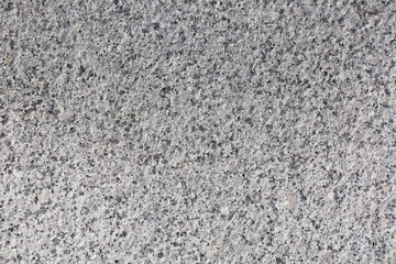 A stone-patterned wall.