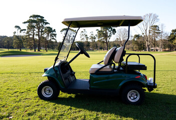Golf Cart on a Scenic Golf Course, Perfect for Leisure and Sport Concepts.