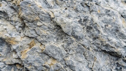 Fototapeta premium Close-up of a rough gray rock surface , close up, rough, gray, rock, surface, texture, natural, stone, background, detailed