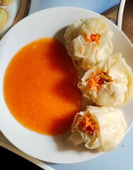 Close up dim sum indonesian food dumplings in a dish