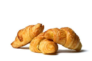 Close up view of three Freshly baked mini croissants isolated on white background. Fresh croissant bread isolated.