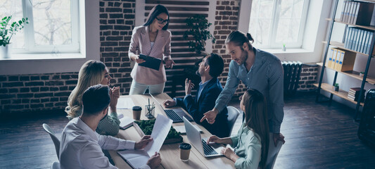 Group of nice busy smart clever skilled managers discussing plan progress delegation leasing at...
