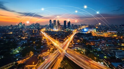 Obraz premium A city skyline at sunset with connected lines symbolizing technology and communication.