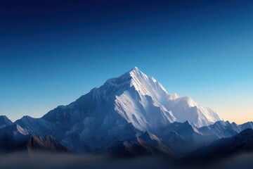 Fototapeta premium A mountain range with a snow covered peak and a clear blue sky