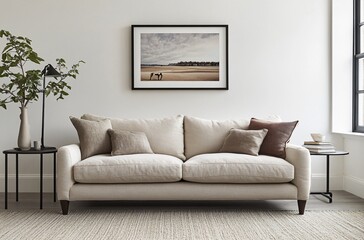 Warm-toned living room with a blank decorative painting hanging in the center, showcasing a minimalist design that emphasizes the beauty of space and modern interior decoration.