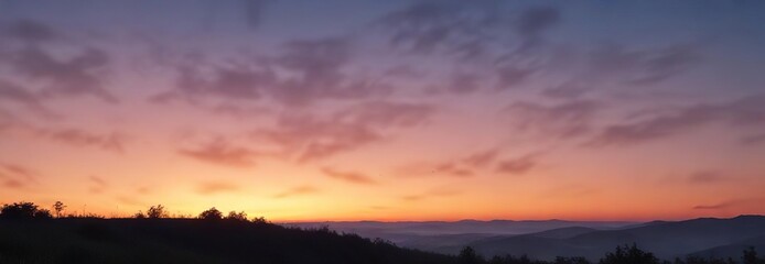 Obraz premium Orange and blue color gradation in the morning sky, calming atmosphere, warm cool hues