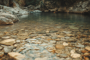 Obraz premium Landscape view of river on shallow spot with plenty of rock and stone, Relaxation stream with water current, Waterfall among canyon with peaceful vibe.