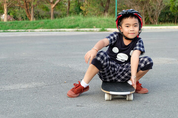 Boy playing skateboard.	