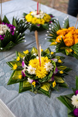 Fototapeta premium Traditional Thai Krathong with Floral Decorations