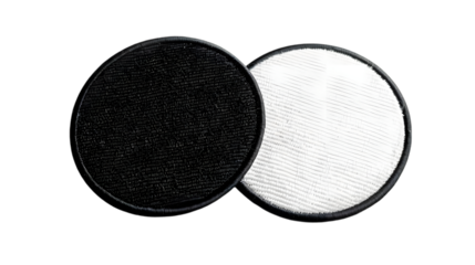 Blank black and white round embroidered patch mockup, top view isolated on a transparent background
