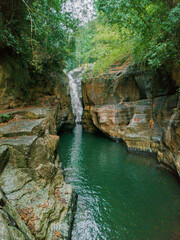 Drone shot of amazing canyon with unique rock formations at Cunca Wulang, West Manggarai, Indonesia