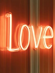 A neon sign that says Love in orange letters