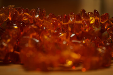 Amber necklace twisted into a ball.
