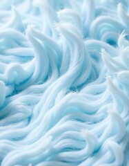 Obraz premium A close-up of soft, fluffy cotton fibers, ready for spinning.