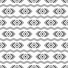 Abstract ethnic seamless geometric pattern. Tribal and ethnic motif with rhombuses, zigzag lines. Black and white vector background. Design for background, clothing, wrapping, batik, fabric.