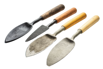 A row of old-fashioned garden tools are lined up on a white background. on transparent background.