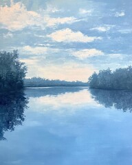 Serene landscape depicting a calm river under a blue sky.
