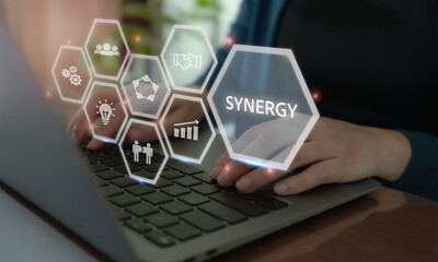 Business Synergy Concept. A business professional interacting with a virtual interface displaying...