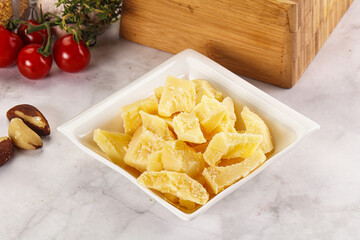 Crushed parmesan cheese in the bowl