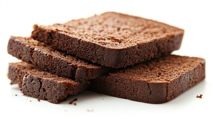 Slices of dark chocolate bread on white background.