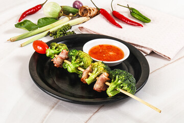 Thai Street foof satay with bacon and broccoli