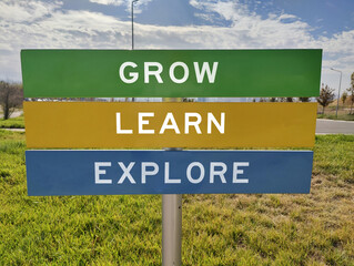 Colorful Signpost of Discovery: Explore, Learn, Grow – A Metaphorical Journey of Curiosity, Knowledge, and Self-Development Inspiring Growth, Exploration, and the Pursuit of Lifelong Learning.