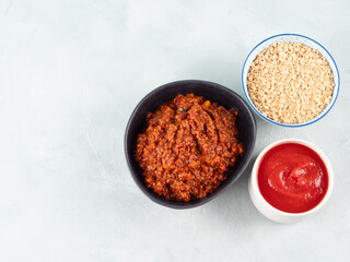Vegan tomato bolognese ragu with soya protein granules in bowl