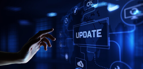 Update system software new version upgrade download. Hand pressing button on screen.