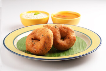 Medu Vada, a popular South Indian food served with Sambar ,Green coconut chutney ,Vada ,Medu vadai...
