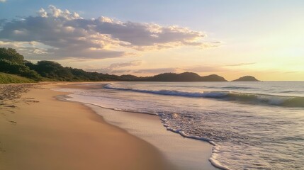 Obraz premium Tranquil Sunset Serenity, a peaceful beach scene with soft waves caressing the shore, vibrant warm hues in the sky, an ideal setting for relaxation and contemplation.