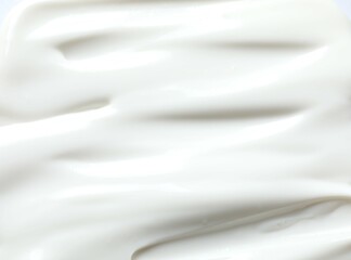 Obraz premium White cream as a background. close up