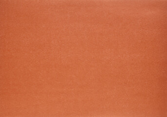 Fototapeta premium Abstract red paper for background. Clean wrapping paper. Grainy surface.