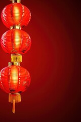Fototapeta premium Vibrant Red Chinese Lanterns Against a Striking Crimson Background