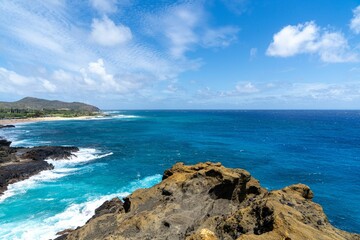 Coastal cliffs and turquoise ocean in Hawaii