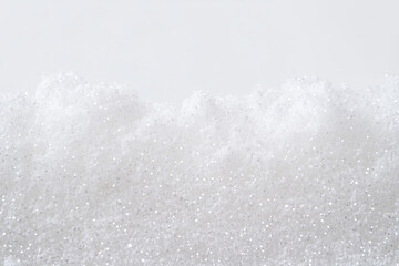 Obraz premium Minimalist Snowy Background with Sparkling White Texture and Space for Copy