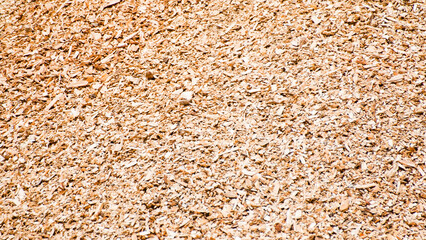 The photo shows a close-up of wood chips