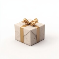 A gold wrapped box with a bow on top