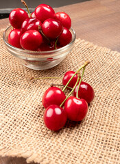 Fresh ripe cherries on wooden background
