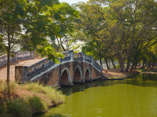 Fototapeta premium details in park of ancient city Ayutthaya and iconic landmarks, showcasing intricate architecture, historical ruins, and cultural heritage in serene atmosphere of this UNESCO World Heritage site.